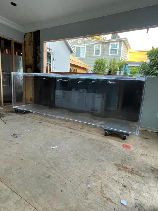 After: the same aquarium with clear, polished panels.